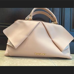 Bebe pink and gold handbag